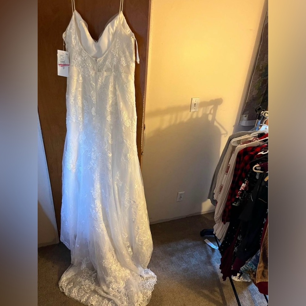 Size 14 wedding dress, display dress, ivory  color